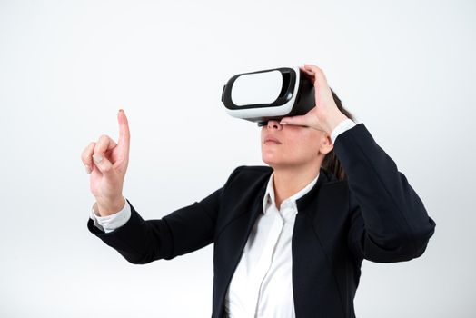 Woman Wearing Vr Glasses And Pointing On Important Message With One Finger.