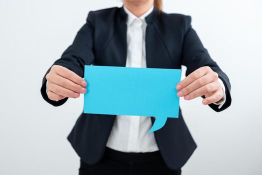 Businesswoman Holding Speech Bubble With Important Messages.