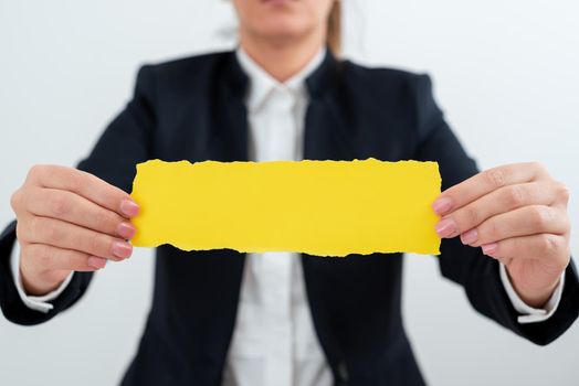 Businesswoman Holding Note With Important Message With Both Hands.