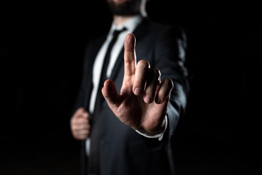 Businessman Pointing Important Infortmations With One Finger.