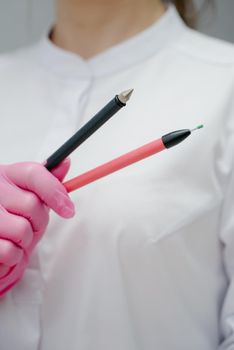 Electroepilation needle close-up. Hardware permanent removal of unwanted hair in the salon.