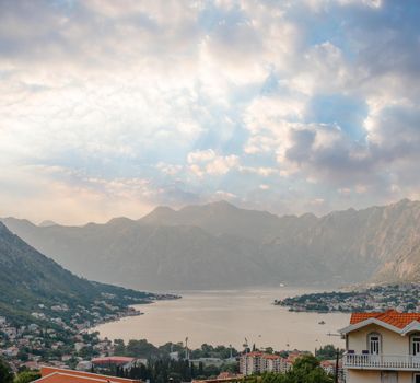 Sunset, beautiful landscape with silhouettes of trees. Travel concept. Montenegro, Kotor Bay. Sunset at Kotor Bay Montenegro. View of the sunset in Boko-Kotor Bay in Montenegro.