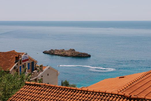 Sveti Stefan is a small isand on Adriatic coast of Montenegro near of Budva. Resort is known commercially as Aman Sveti Stefan. Sveti Stefan, Adriatic sea, Europe. Sveti Stefan peninsula on the Adriatic Sea in Budva, Montenegro