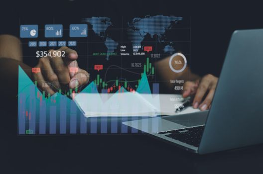Business analysis and economic growth big data with financial graphs. Concepts of digital virtual screen marketing dashboard technology and global economic network connection.