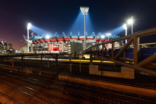 Dusk view of Melbourne's famous skyline and Melbourne Cricket Ground stadium in Melbourne, Victoria, Australia.