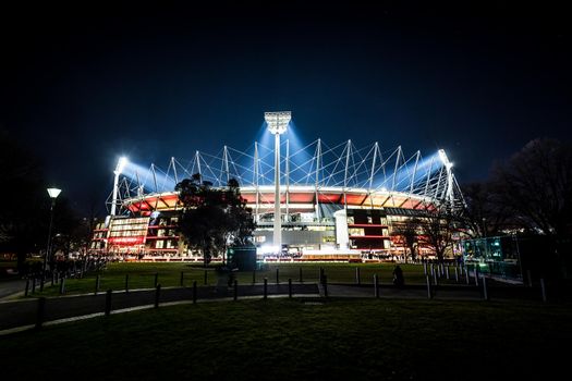 Dusk view of Melbourne's famous skyline and Melbourne Cricket Ground stadium in Melbourne, Victoria, Australia.
