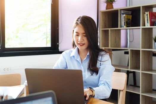 freelance concept,female using computers to design work as ordered by customers