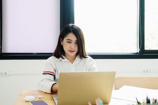 freelance concept,female using computers to design work as ordered by customers