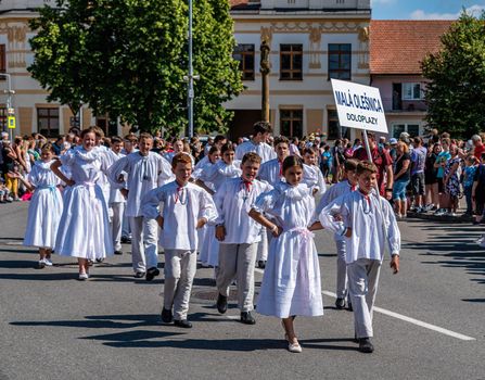 Straznice, Czech Republic - June 25, 2022 International Folklore Festival. Children's ensemble in white folk costumes