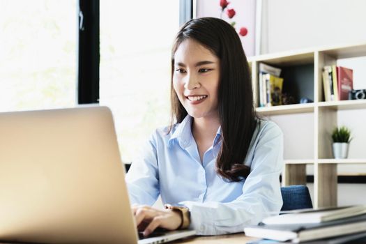 freelance concept,female using computers to design work as ordered by customers