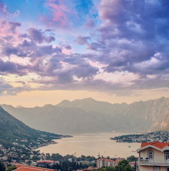 Sunset, beautiful landscape with silhouettes of trees. Travel concept. Montenegro, Kotor Bay. Sunset at Kotor Bay Montenegro. View of the sunset in Boko-Kotor Bay in Montenegro.