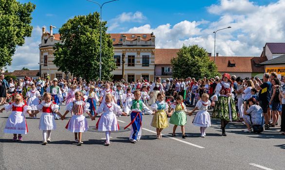 Straznice, Czech Republic - June 25, 2022 International Folklore Festival. Children in folk costumes take part in the festival