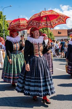 Straznice, Czech Republic - June 25, 2022 International Folklore Festival. 6ena in folk costume Hanacka in the procession in Straznice