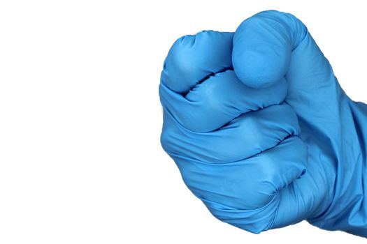 Isolated hand in a blue medical glove clenched into a fist close-up on a white background..