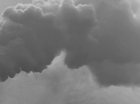 Textures and backgrounds for photography. Smoke against a gloomy sky. Chemical industry in the background of the sky.