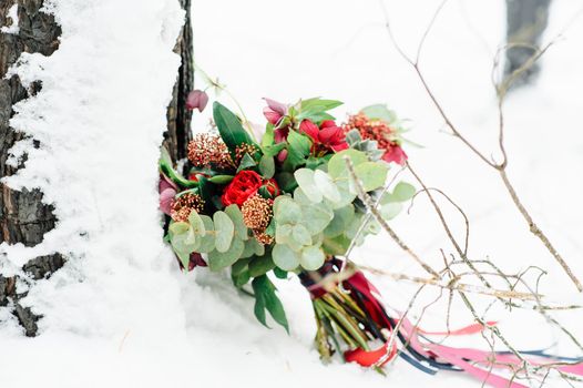 bridal bouquet on snow