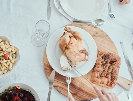 Happiness is having dinner as a family everyday. a family having lunch on a table at home