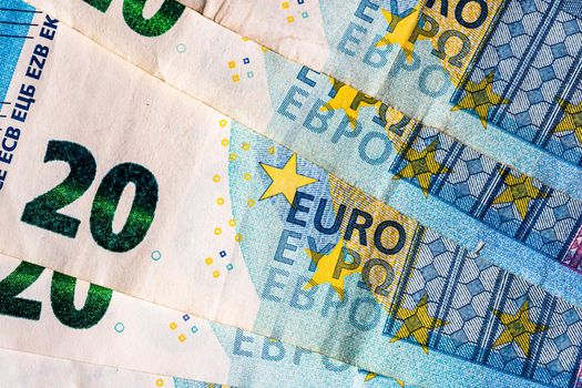 Selective focus on detail of euro banknotes. Close up macro detail of money banknotes, 20 euro isolated. World money concept, inflation and economy concept