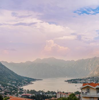 Sunset, beautiful landscape with silhouettes of trees. Travel concept. Montenegro, Kotor Bay. Sunset at Kotor Bay Montenegro. View of the sunset in Boko-Kotor Bay in Montenegro.