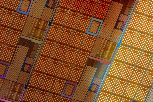 Silicon monocrystalline wafer with microchips after photolithography etching manufacturing used in fabrication of electronic integrated circuits. Full-frame high-tech macro background.
