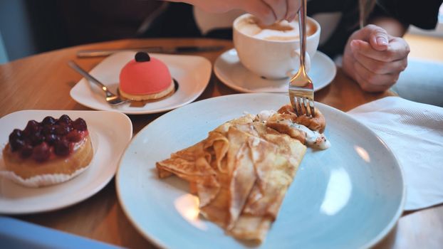 A table of cakes and coffee at a girl's breakfast