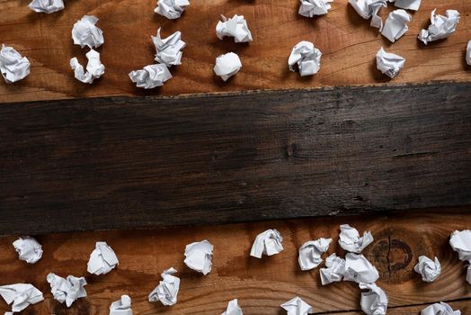 Important Ideas Written On Piece Of Wood With Paper Wraps Around On Floor.