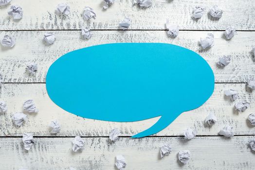 Paper Wraps Placed Around Speech Bubble With Important Information.