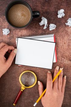 Woman With Blank And Crumpled Papers, Coffee Cup And Stationery.