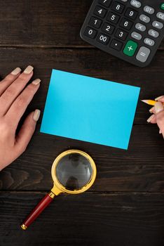 Hands Of Woman With Blank Paper And Stationery For Advertisement.