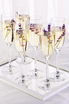 Lavender mood. Champagne with soft gentle notes of lavender. Drink for a wedding dinner. Wedding theme ideas.