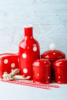home kitchen decor polca dots for oil, salt, sugar and peper on wooden background