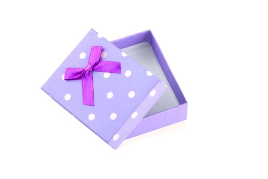 purple gift box with bow isolated on white background