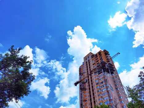 Kyiv, Ukraine - July 10, 2022: The building renovation after Russian rocket attack on Kyiv