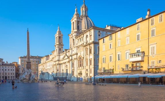 ROME, ITALY - CIRCA AUGUST 2020: Sunrise light on Piazza Navona (Navona Square) buildings