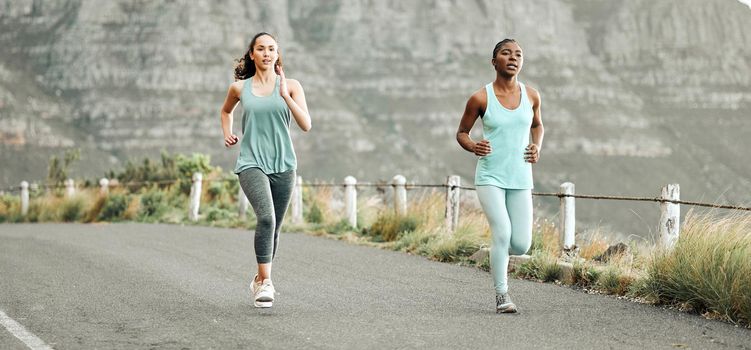 Lets go for a run. two young women on a run in the morning