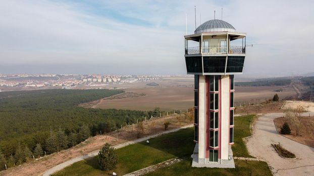 29 December 2020 Eskisehir Turkey. Scenery tower in Eskisehir city forest among the pine trees aerial drone view