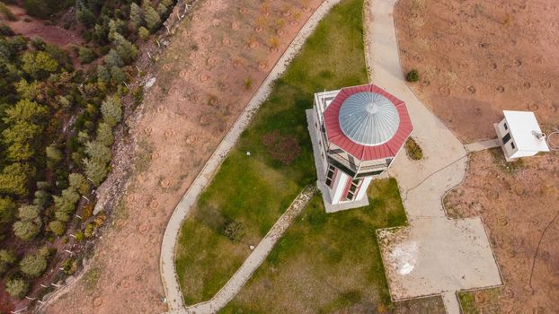 29 December 2020 Eskisehir Turkey. Scenery tower in Eskisehir city forest among the pine trees aerial drone view