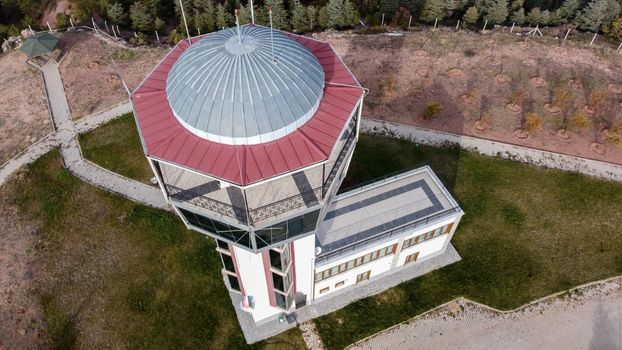 29 December 2020 Eskisehir Turkey. Scenery tower in Eskisehir city forest among the pine trees aerial drone view