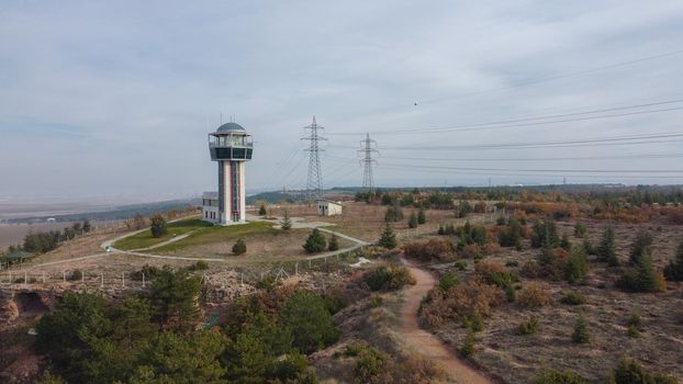 29 December 2020 Eskisehir Turkey. Scenery tower in Eskisehir city forest among the pine trees aerial drone view