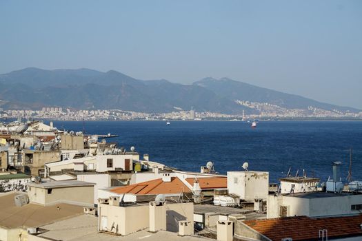 Izmir alsancak seaside with roof of the buildings