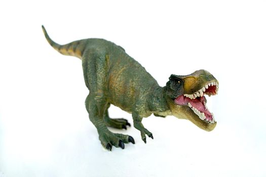 Tyrannosaurus dinosaurs toy isolated on white background with clipping path. High quality photo
