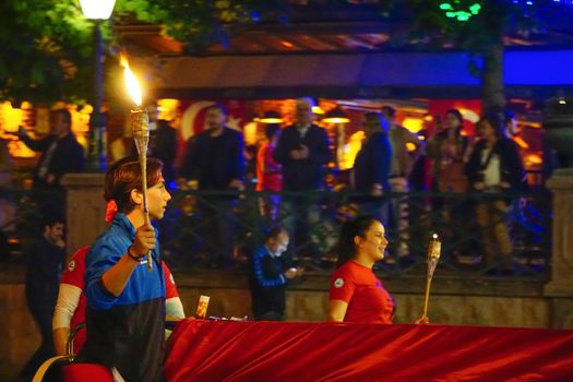 19 May 2019 Eskisehir Turkey. Young boy holding fire torch that symbolises the independence of Turkish nation on 19 May National Independence Parade