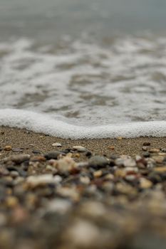 Pebble beach stone coastline close up view