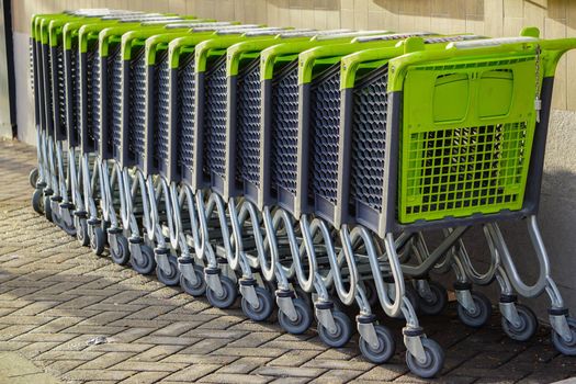 Shopping carts in a row close up
