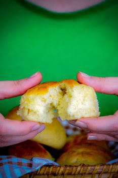 Woman spreading home made bread in hand close up view portrait image