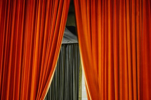 Red stage curtain at the theatre