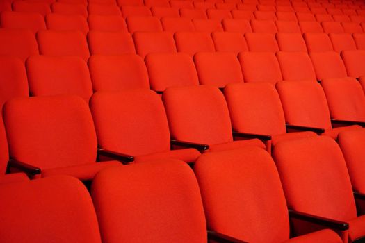 Red theater seats in a row