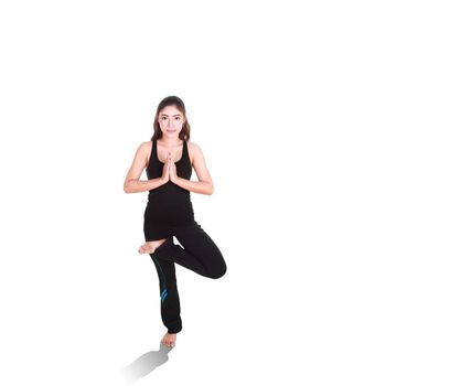 Young woman doing yoga exercise isolated on white background