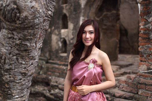 Female in Thai traditional dress at  historical park