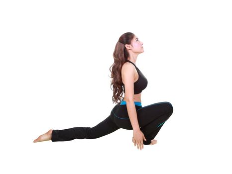 Young woman doing yoga exercise isolated on white background